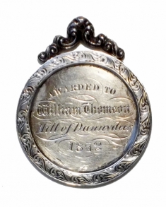 Reverse side of silver medal